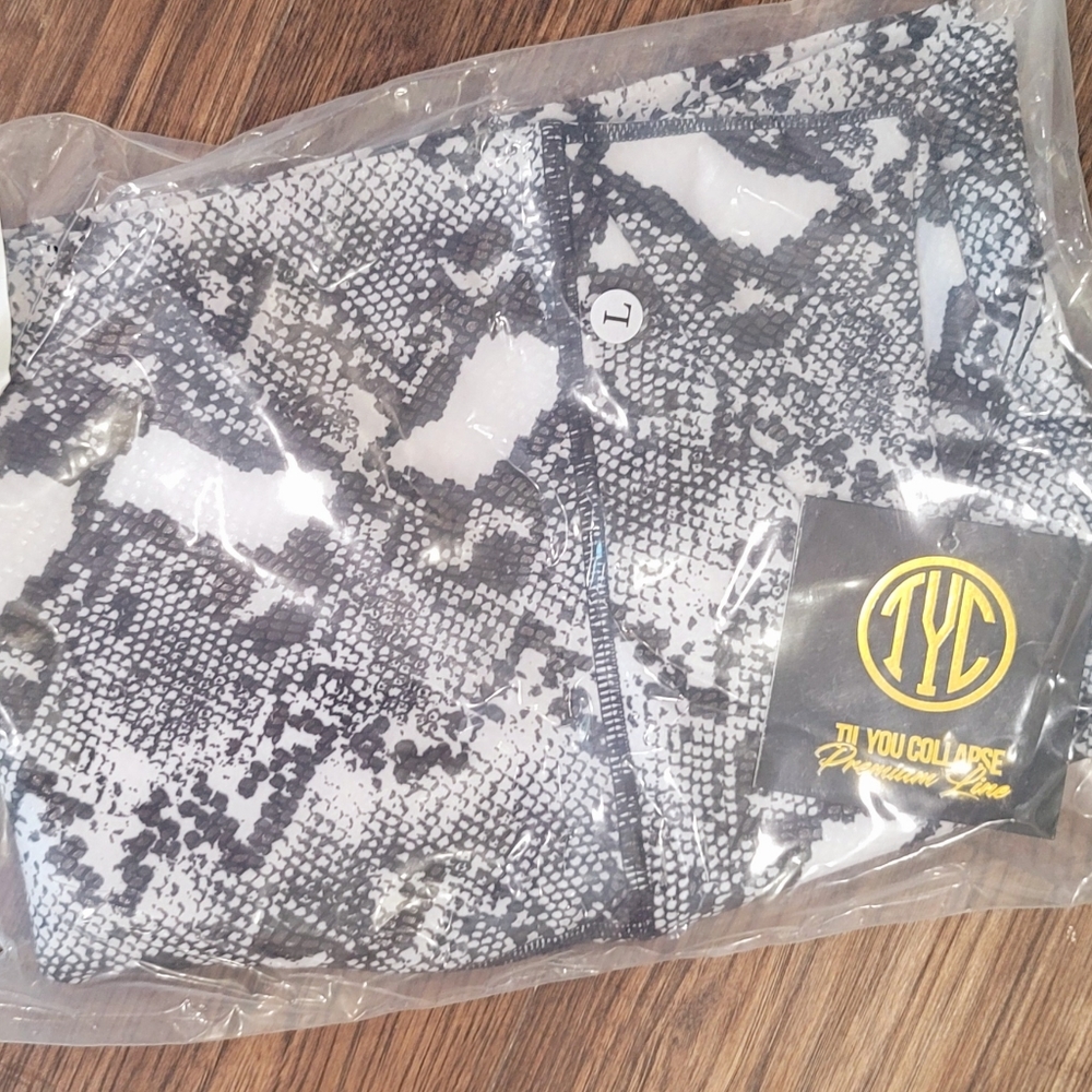 TYC snakeskin crossover leggings